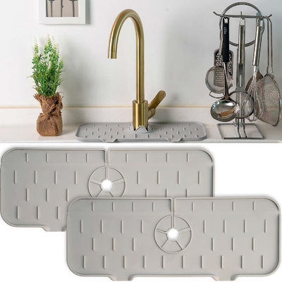 Un bon prix. Garde d'éclaboussure pliable molle de robinet de silicone, plateau de receveur d'égouttement de poignée de robinet de silicone en ligne