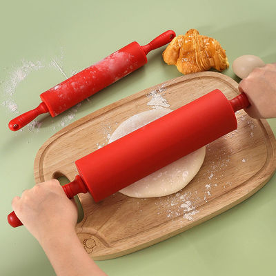 Un bon prix. Manivelle de broche à rouleaux en silicone non collant pour gâteau de cuisine à la maison en ligne