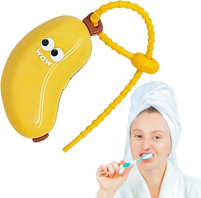 Un bon prix. Couvercle de brosse à dents en forme de banane et kit de contenant de dentifrice en silicone pour les voyages en ligne