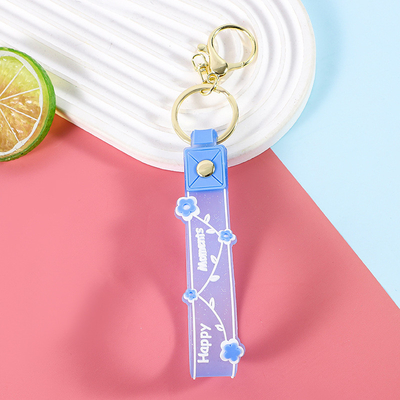 Des porte-clés en silicone doux et sans BPA pendentifs porte-clés de poignet bracelet cadeaux pour les filles