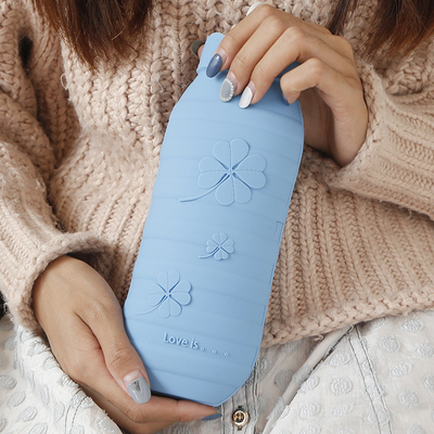 Un bon prix. Bouteille d'eau chaude en silicone classique pour le chauffage du lit menstruel en ligne