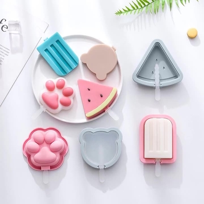 Formes de crème glacée pour enfants - 4 paquets, 10 cavités Formes de crème glacée en silicone de qualité alimentaire, avec des bâtons réutilisables, un design plat et non collant, facile à décharger, empilable pour économiser de l'espace